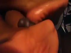 My wife is a carnal, disgusting harlot who likes to stroke my black dick with her foot.